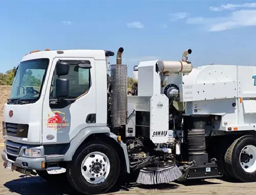 Regenerative air sweeper service for streets, parking lots, and job sites