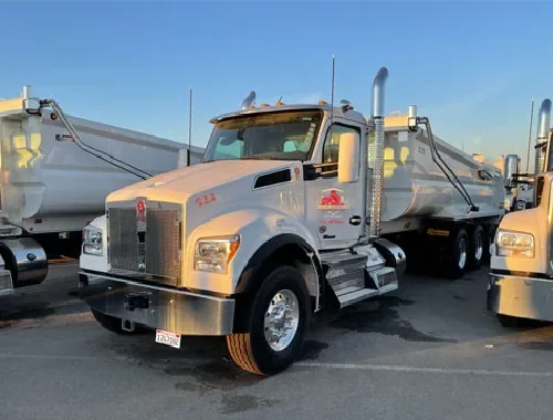 Supertag dump truck service for heavy construction hauling