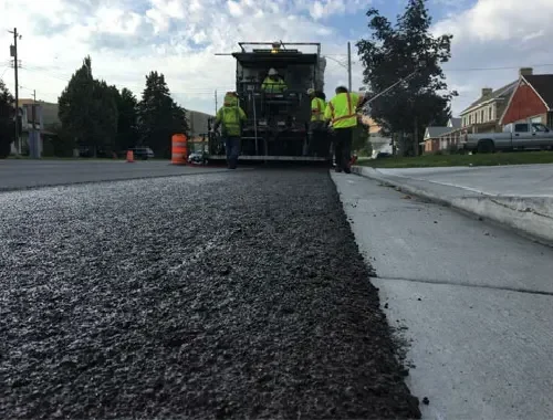 Slurry material hauling for paving, roadwork, and construction cleanup
